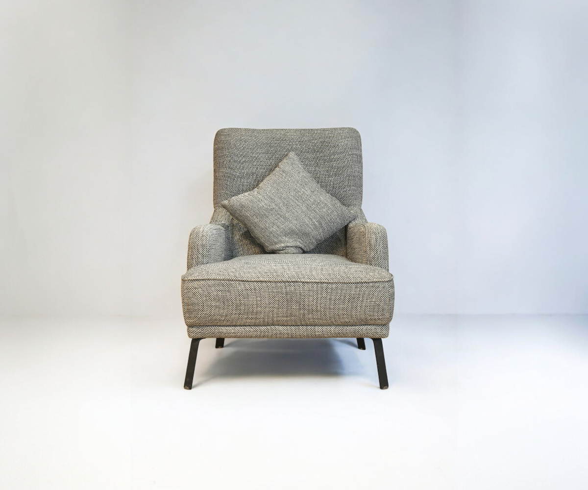 VERSACE grey fabric sofa set in a bright room with tall windows