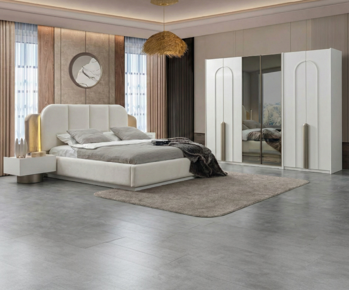 VIOLA curved boucle bedroom set staged in a bright room with a rattan pendant