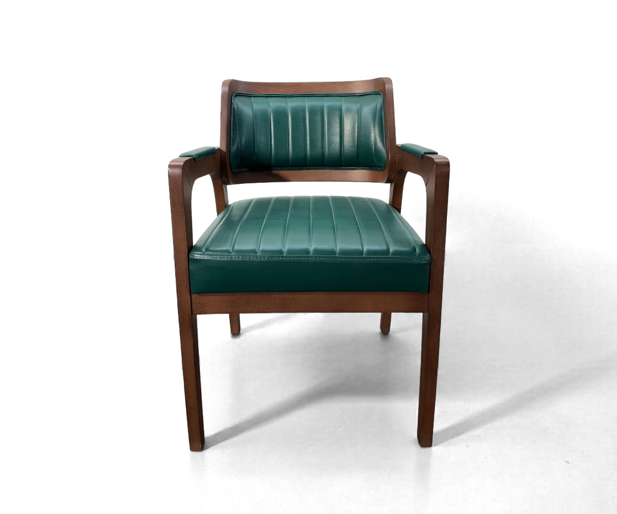 WISH armchair on a garden patio beside potted flowers and a side table
