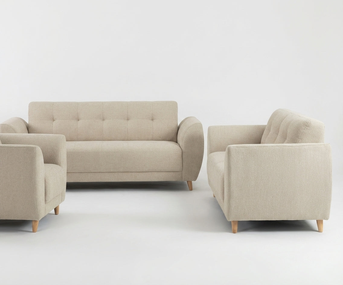 Zaina beige fabric sofa set in a bright marble-walled living room