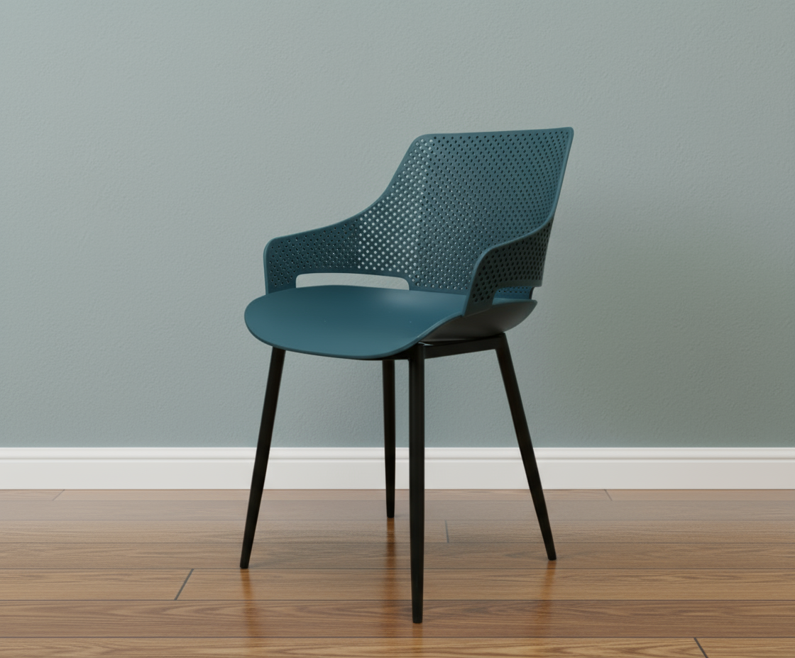 Zenith teal perforated designer armchair, angled view on a wood floor